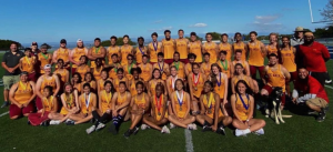The track and field team and coaches at a meet on May 1.