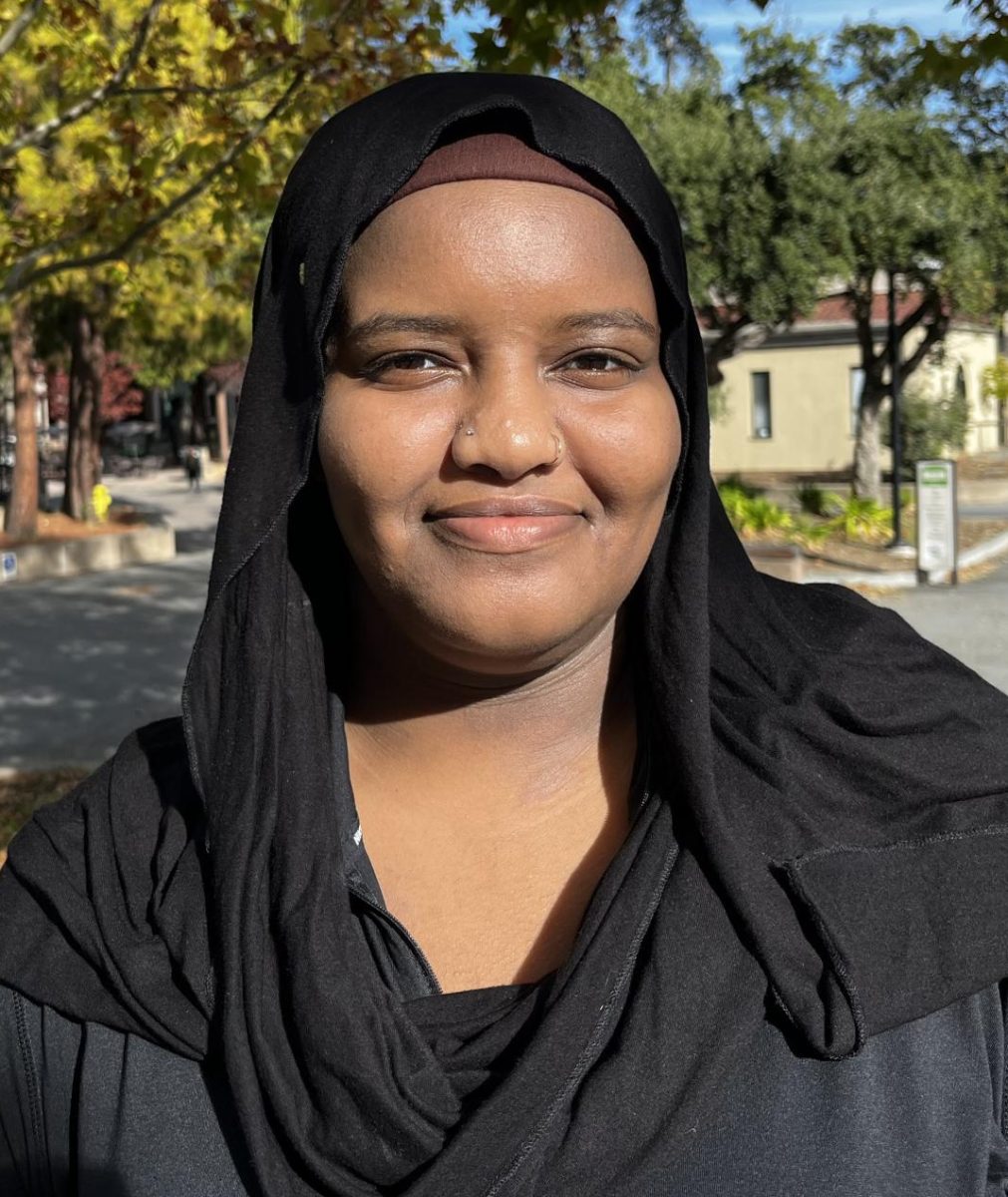 Johara Ahmed, 20, biology major, is making her way through campus on Nov. 14