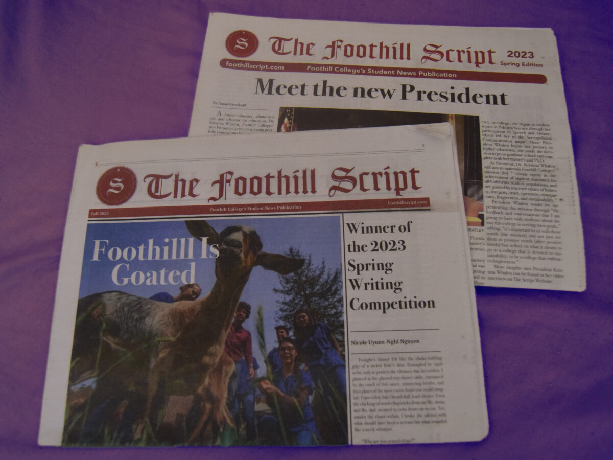 Both+print+copies+of+The+Foothill+Script+from+its+most+recent+revival%2C+laid+out+on+a+purple+bed.