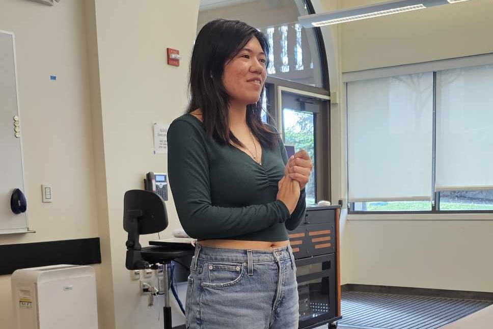 Jamie Dy, 21, liberal arts major is the host of the “Side by Side” student project film session. 