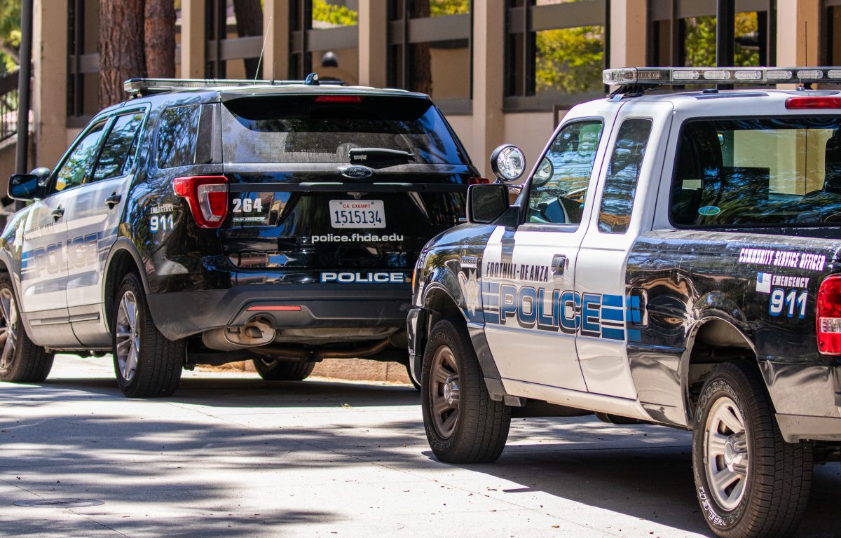 Two police vehicles sit parked outside the FHDA polices De Anza substation on May 16.