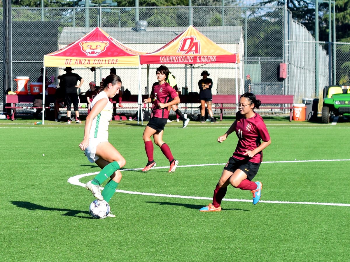 No. 11 Lillian Ngo and No. 5 Jennifer Icaza attempting to retrieve the ball at De Anza Soccer field on October 4th.