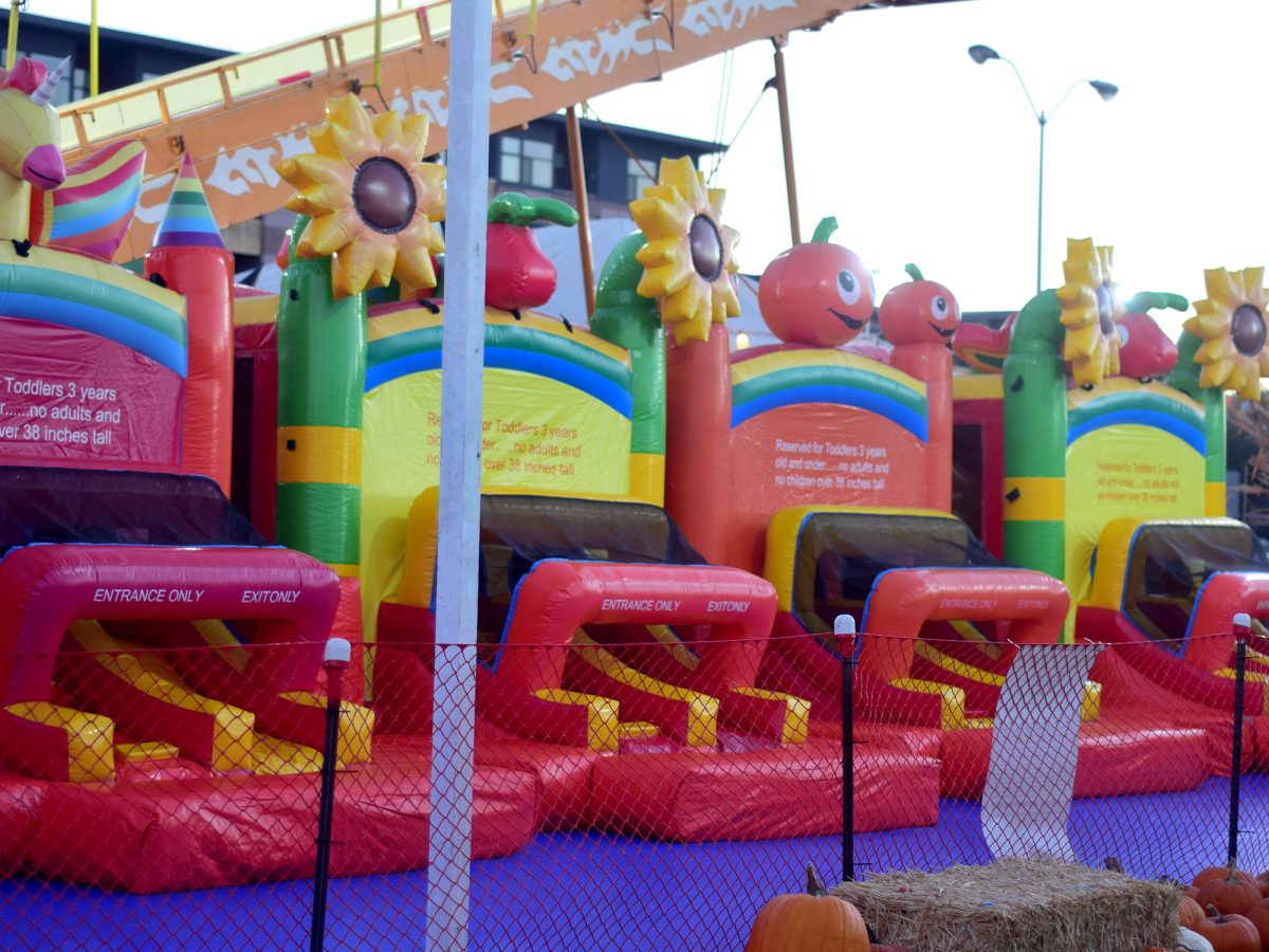 Four of the five inflatables for children under three years old, located between the Super Slide and pumpkin patch on Oct. 15.