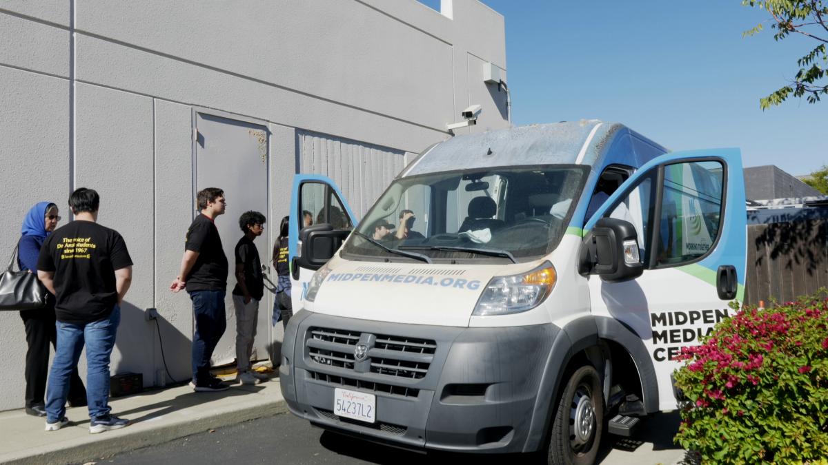 La Voz staff are given a tour of the MidPen Media Center's news van on Oct. 24 in Palo Alto.