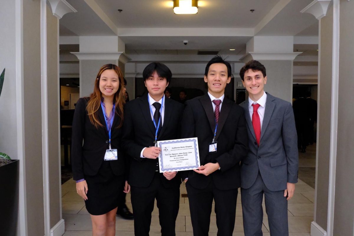 From left, Allison Trinh, 19, a business administration major, Alan Dang, 19, business administration major and vice president of finance at Phi Beta Lambda FBLA, Van Loc Nguyen, 21, business administration major and vice president at Phi Beta Lambda FBLA, and Zain Darwish, 20, business administration major and vice president of internal affairs at Phi Beta Lambda FBLA, after the conference on Nov. 17 in San Francisco.