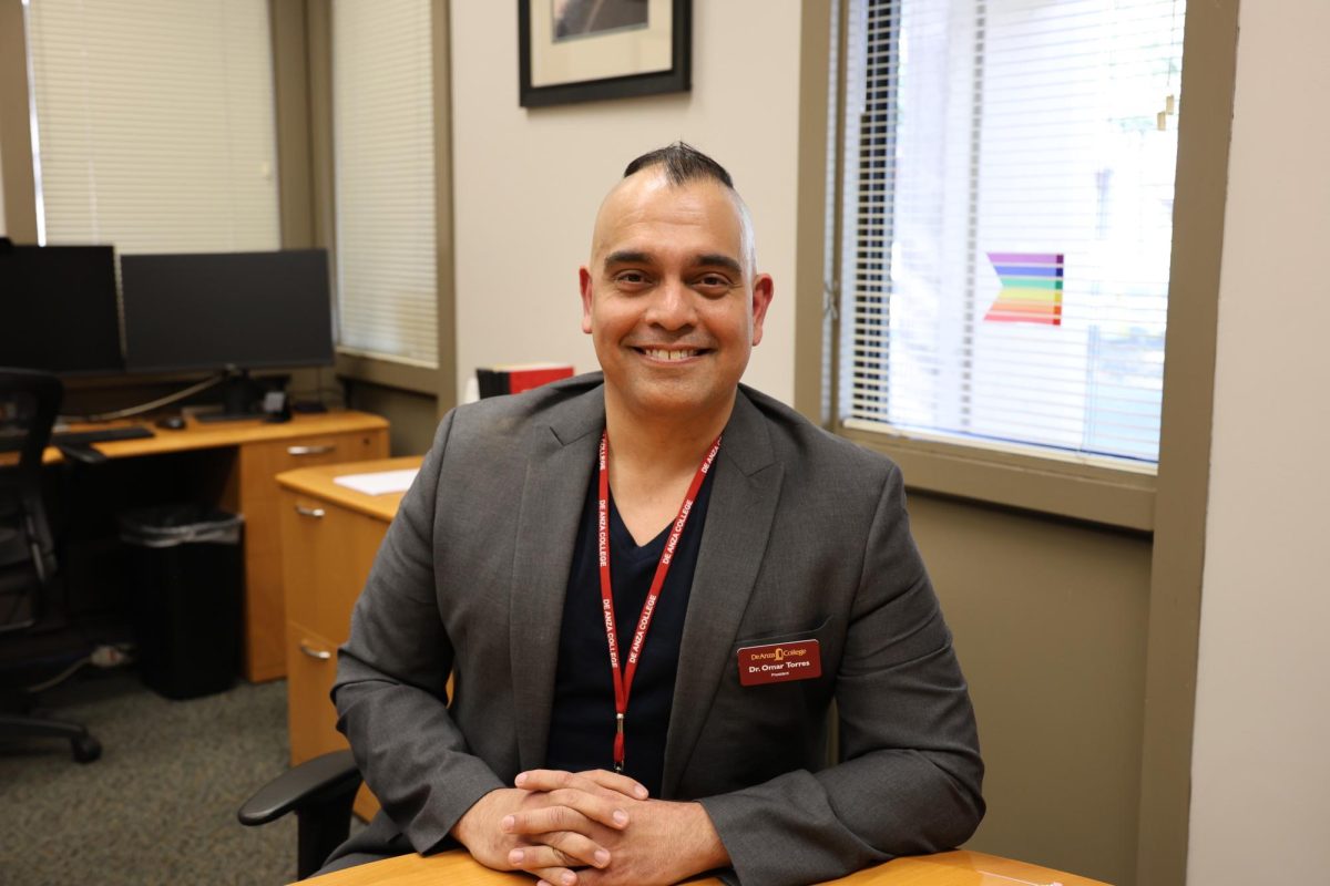 De Anza College President Omar Torres smiles in his office in ADM 127 on Jan. 16.