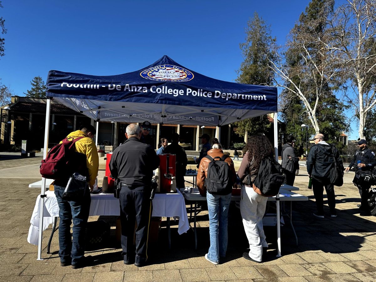 Participants receive coffee and Mexican sweet bread at the Coffee with a Cop event on Feb. 5 in the Main Quad.