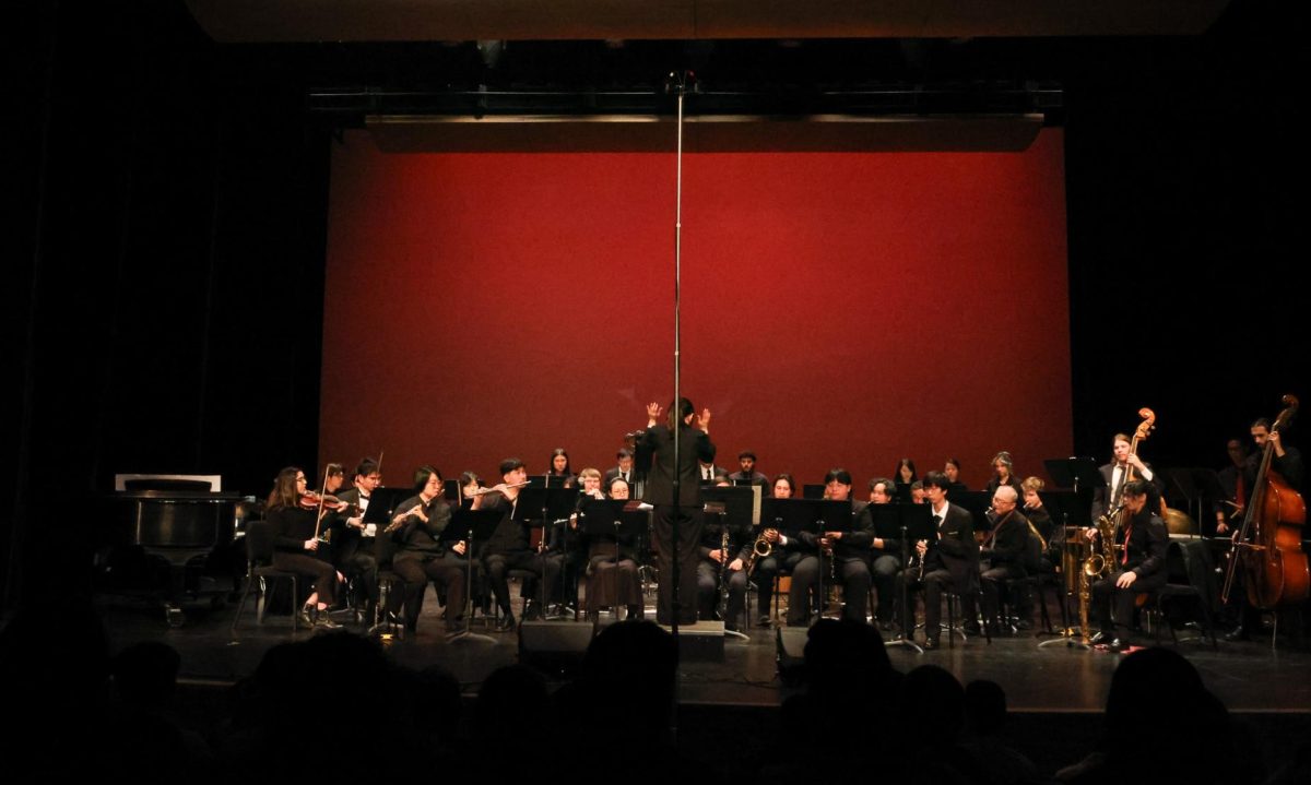 Concert Band opens the concert with a performance of "Quintology" by Richard Meyer, conducted by music department chair Grace Lai on March 15.