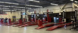 A car lift for wheel alignment and brake repairs at the De Anza College automotive garage on March 4, for students to practice brake pad replacement and wheel alignment.