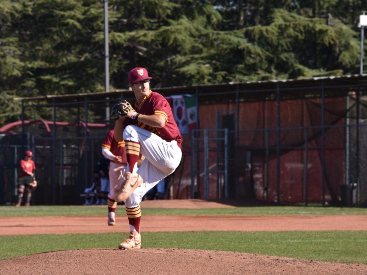 Pitcher Skylar Roenicke (De Anza No. 27) delivers a pitch at the De Anza baseball field on Feb. 25.