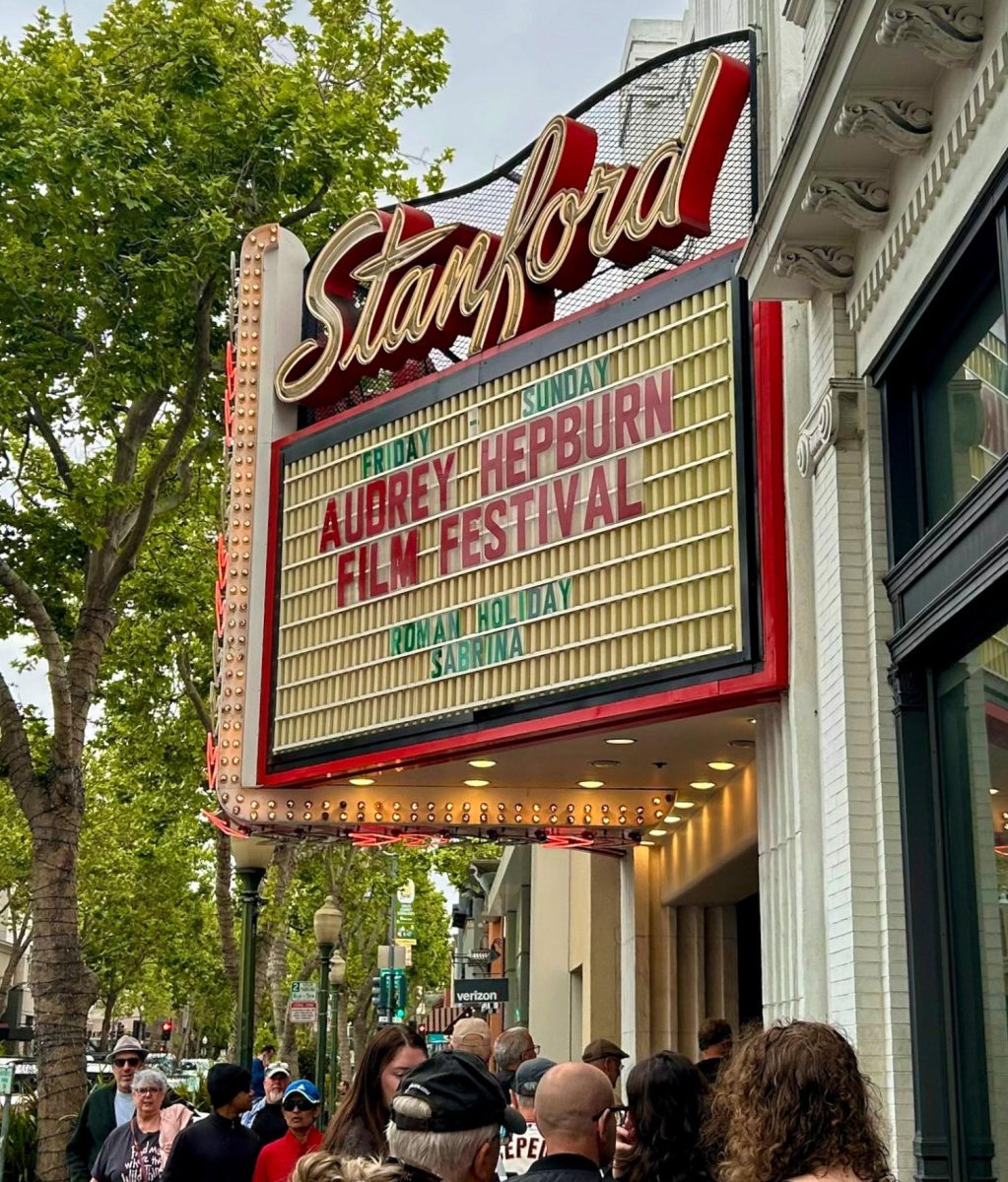 Filmgoers line up outside the Stanford Theatre in downtown Palo Alto to purchase tickets for entry into the Audrey Hepburn Film Festival screening of "Roman Holiday" and "Sabrina" on April 27. The film festival ran for four weeks across every Friday and weekend from April 25 to May 18.