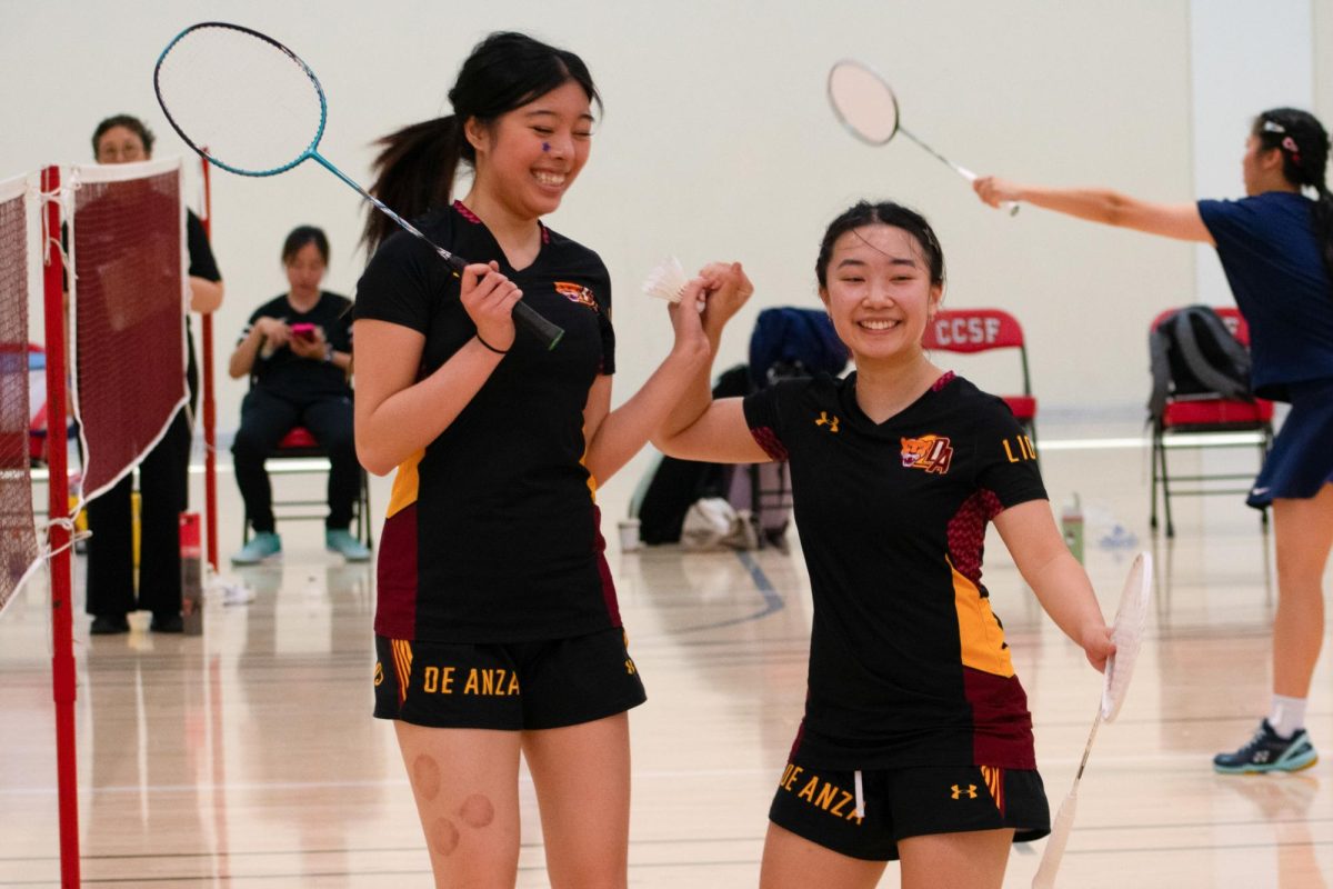 De Anza teammates Natalee Lam, 19, business administration major, and MaiLan Vuong, 19, business administration major, celebrate their 3C2A women’s badminton doubles championship after defeating teammates Jenny Thai, 19, psychology major, and Karina Chow, 18, cognitive science major at the City College of San Francisco on May 10.