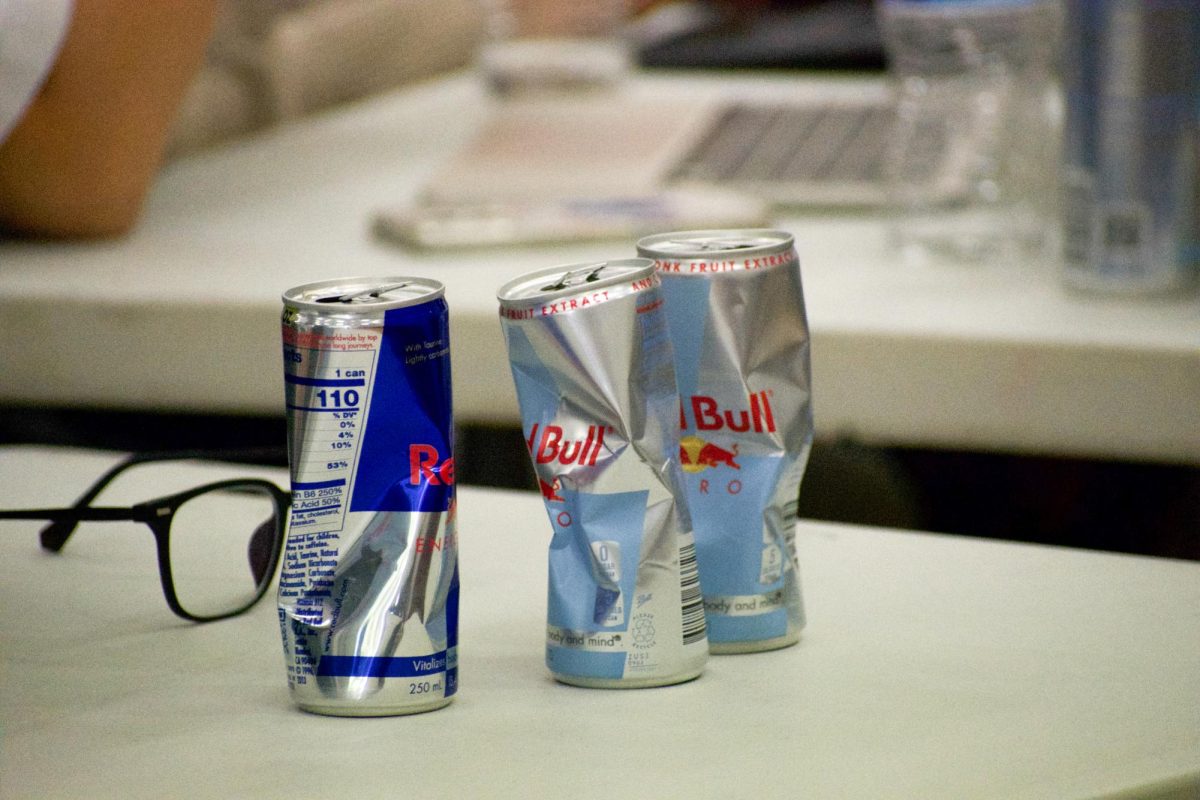RedBull cans litter the tables during the hackathon held in Conference Rooms A & B on May 30. RedBull is one of the many sponsors of this year's DA Hacks 3.5.