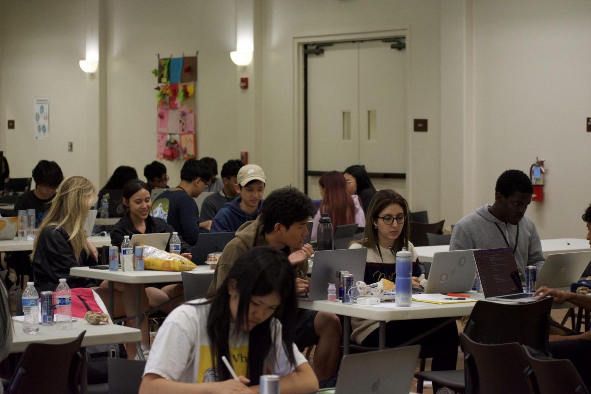 Students code in teams in De Anza's A & B conference rooms, collaborating from 8 a.m. to 8:30 p.m. on May 30.