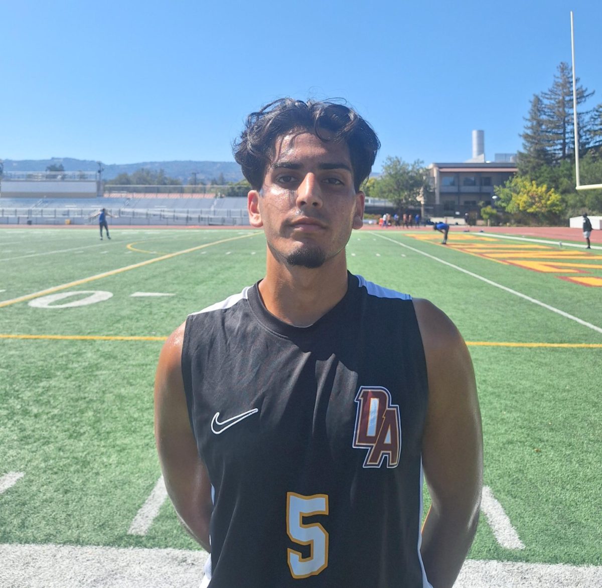 Abrahim Ahmed, 18, accounting major, stands in front of the soccer field on Sept. 23.