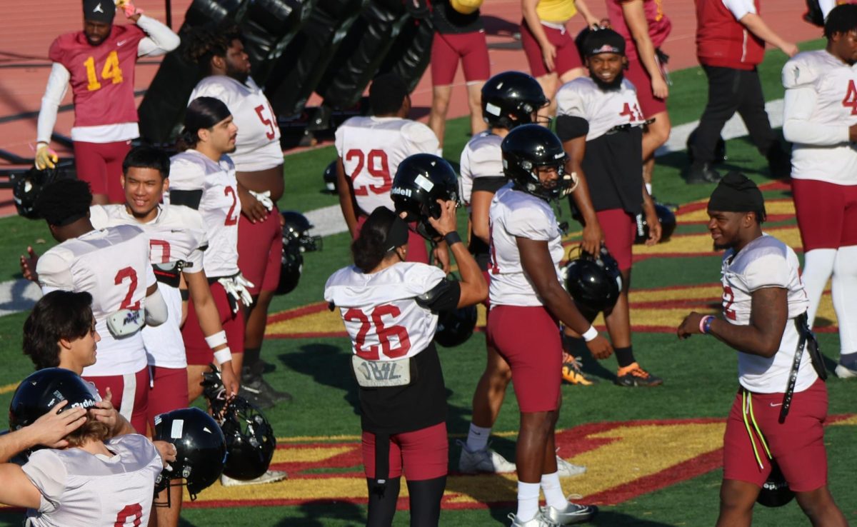 De Anza College football players gather on the field before practice on Thursday, Oct. 9.