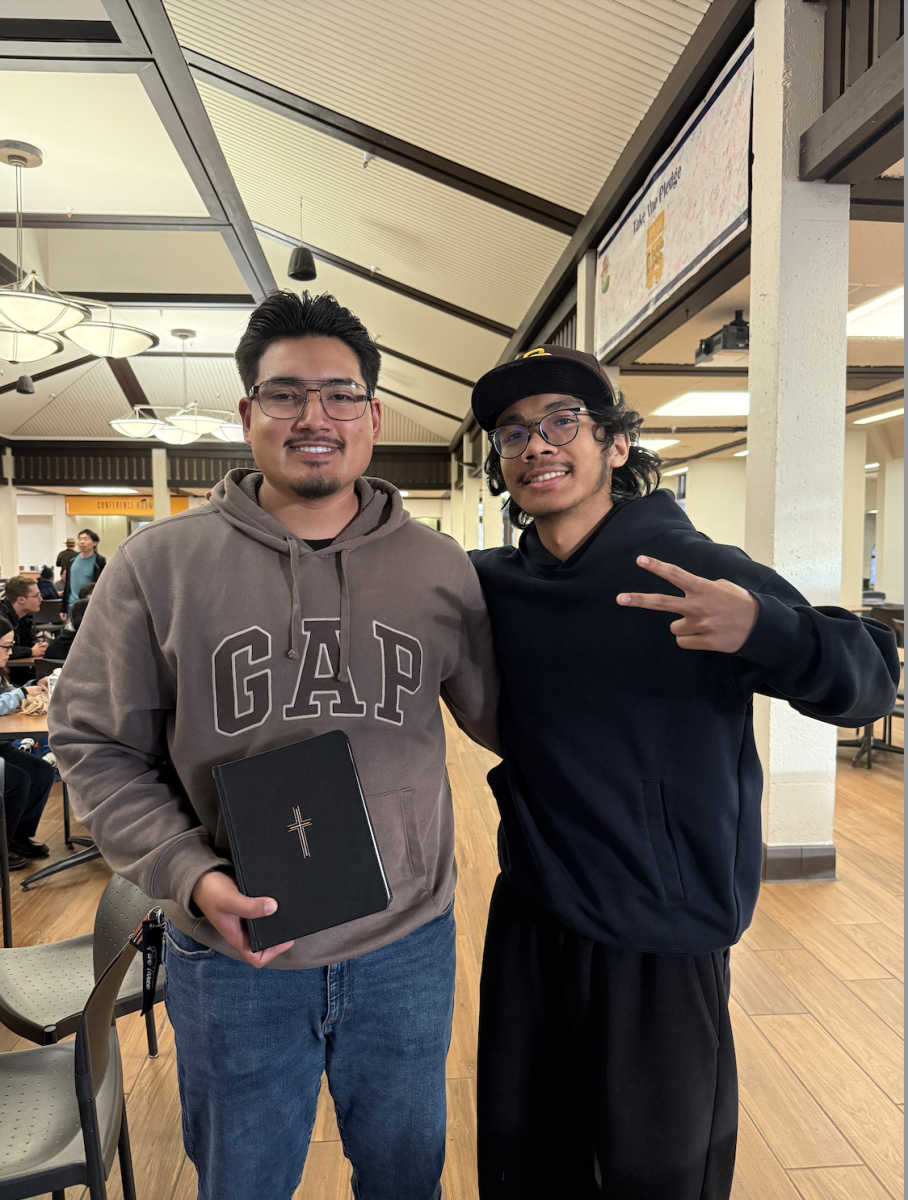 Carlos Reza, 20, criminal justice major (left), lists several goals while Timothy Htut, electrical engineering major (right), shares personal and spiritual goals on Jan. 6.