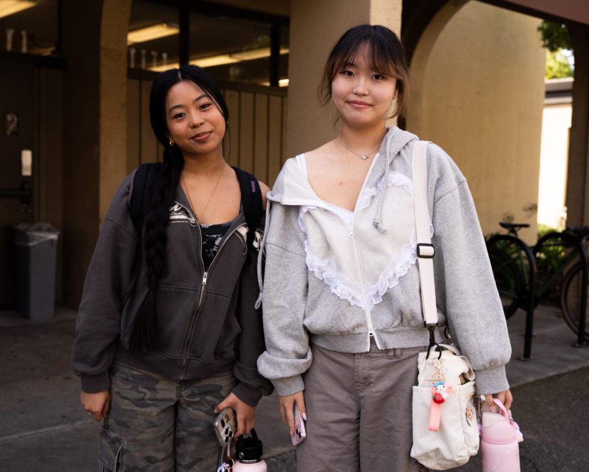 Hailley Abinsay (left), 18, a nursing major, and Yujin Cho, 19, a communications major, contrast each other through similar outfits styled differently.