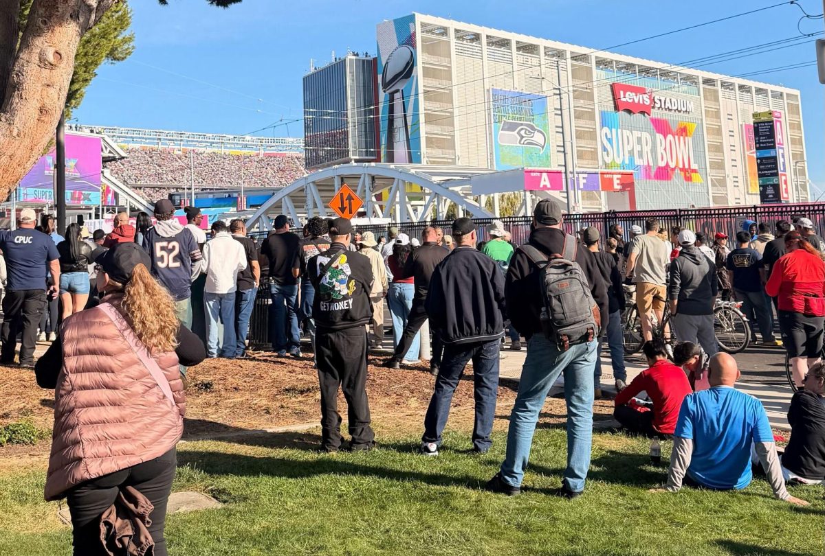 Fans gather outside Levi’s Stadium soaking up every moment of Super Bowl excitement — listening in, cheering on and feeling the game day energy even from the perimeter.