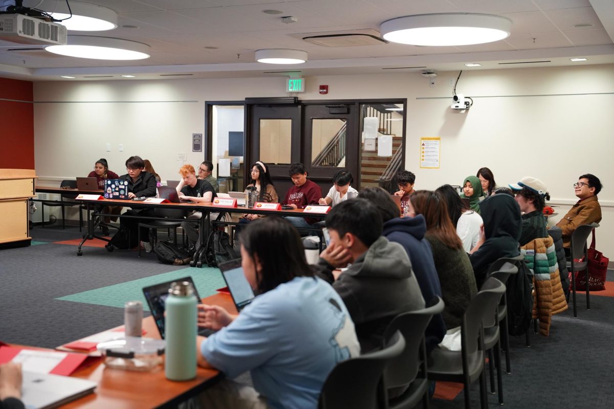 The DASG senate sits in on a presenter's report at its meeting in the Student Council Chambers on Feb. 25.