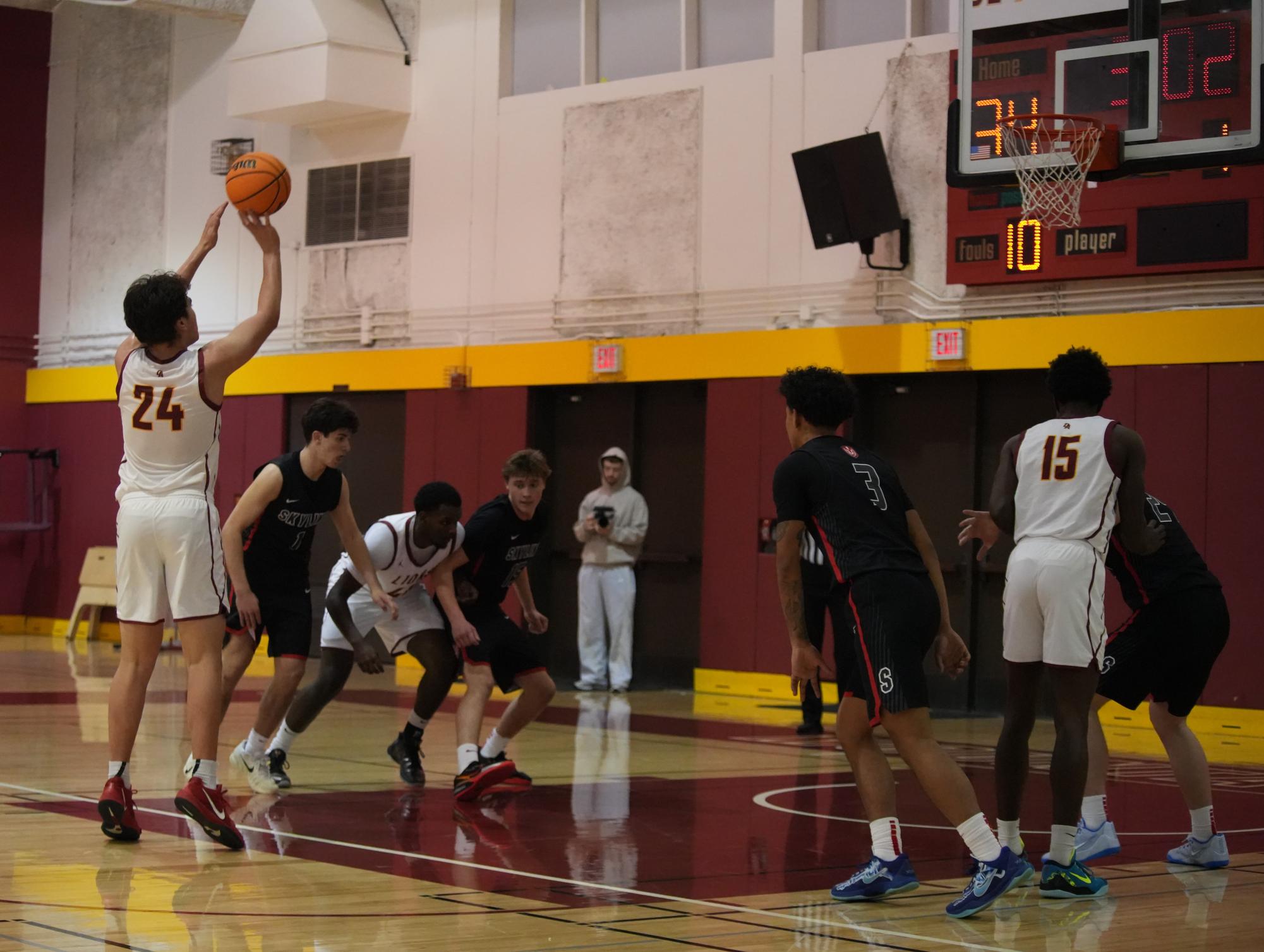 Guard-forward Theo McDowell (De Anza No. 24), 19, business administration major (De Anza No. 24), shoots a free throw in the De Anza College Main Gym on Feb. 20