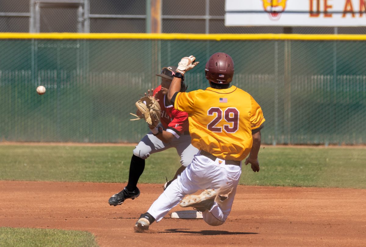 Brandon Kim (De Anza No. 29) runs toward second base in a race against the ball during the conference game at De Anza on March 14.